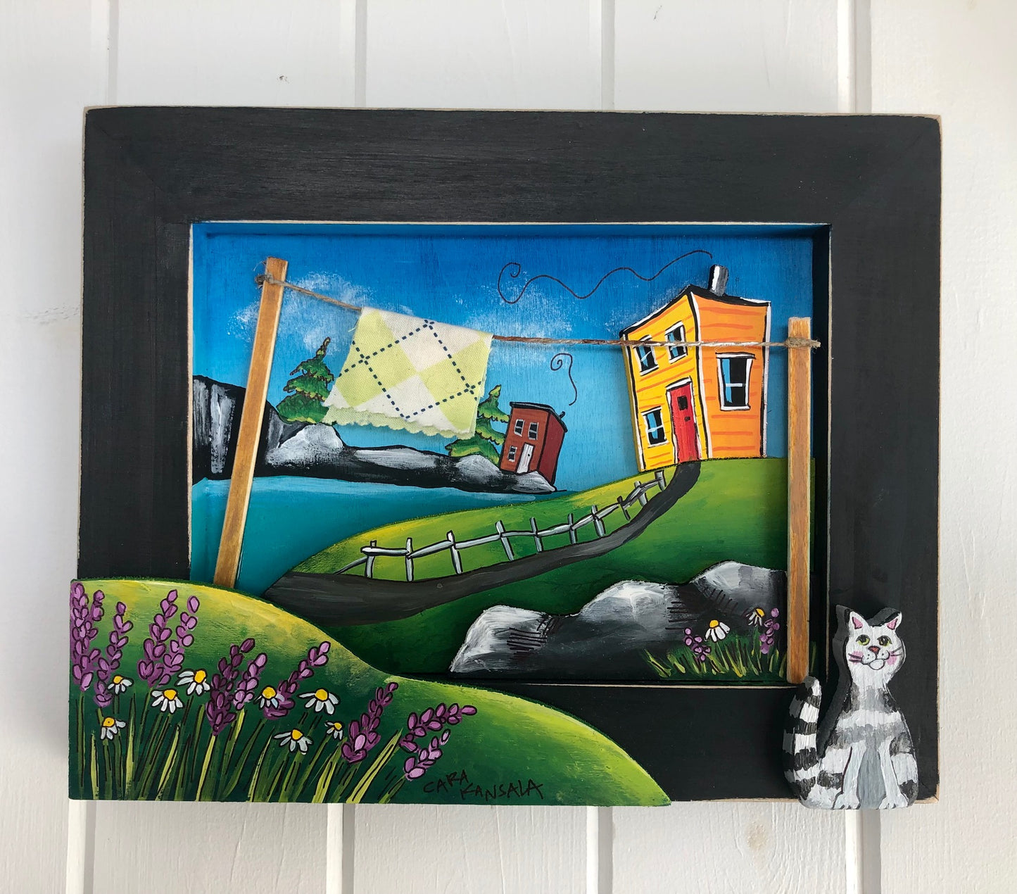 When the little orange cat wakes up from her nap, Buster the cat is going to give her a big bouquet of wild Lupines and ask her to go steady