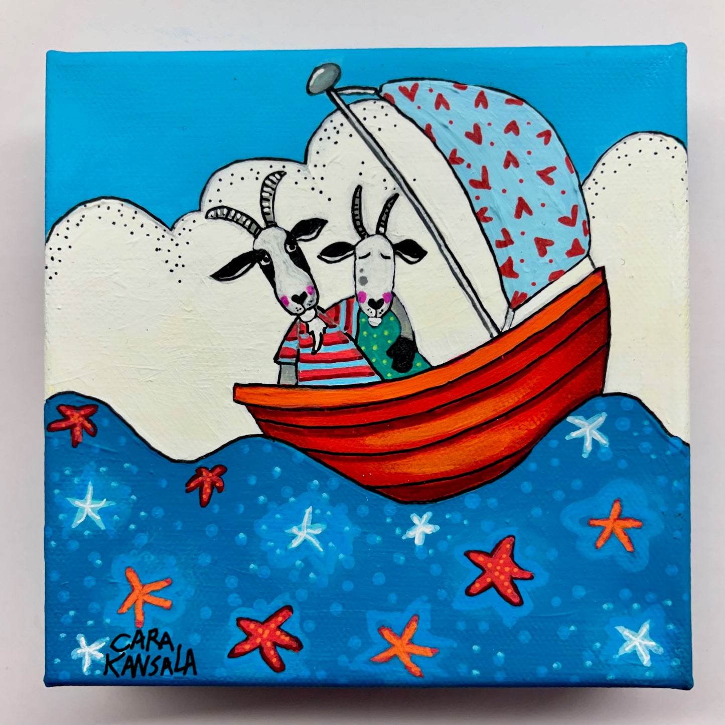 If I were a goat and we had a red boat, we would float on a sea full of stars. We would sail on the sea and we'd follow the breeze and I'd hold you all day in my arms.