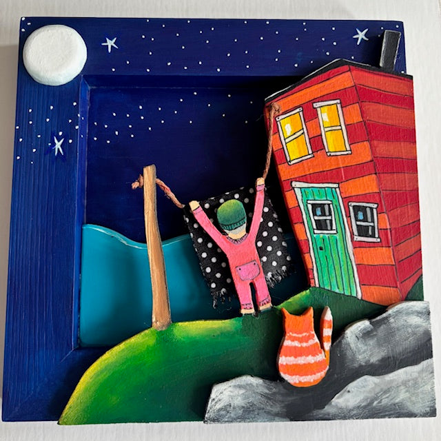 Old Aunt Orla (who always wore long johns to bed) snuck out to get the marmalade cat's blanket off the line so they could both go in for a cozy night's sleep.